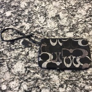 Coach black and silver wristlet